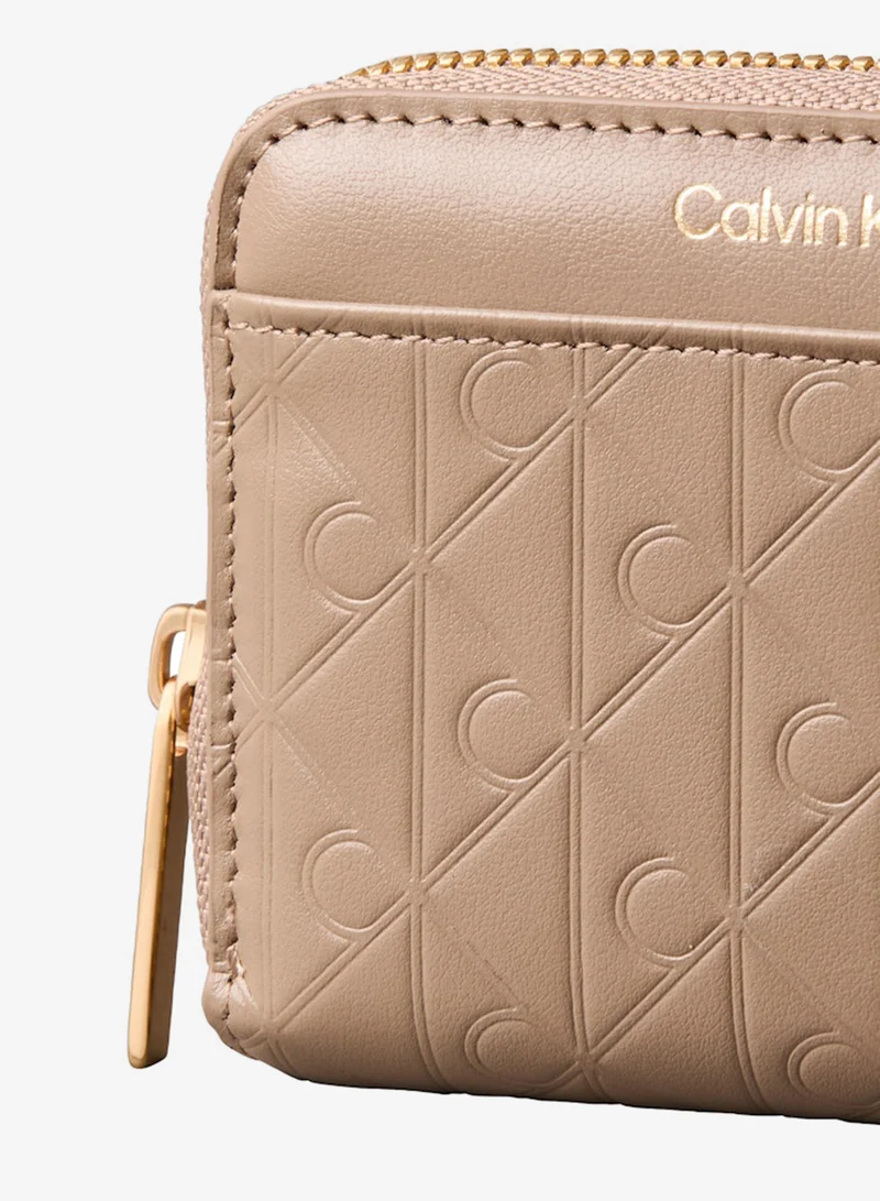 CALVIN KLEIN  Embossed Emblem Logo Zip Wallet for Women | Best Price UAE